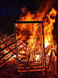 Low angle view of fire crackers at night