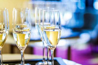 Close-up of wineglasses on table