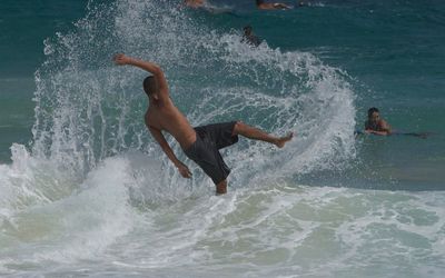 Man surfing in sea