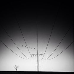 Low angle view of power lines