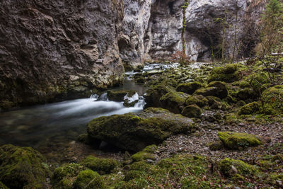 View of waterfall along rocks