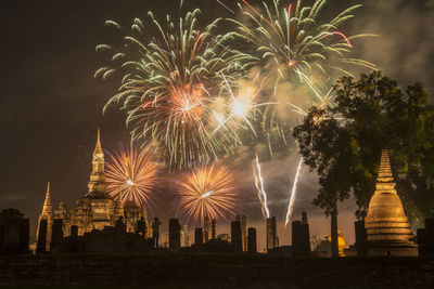 Firework display at night