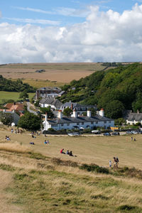 People on field against sky