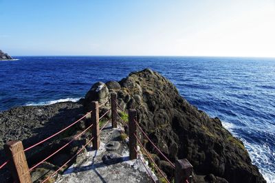 Scenic view of sea against clear sky