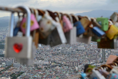 Close-up of padlocks in city