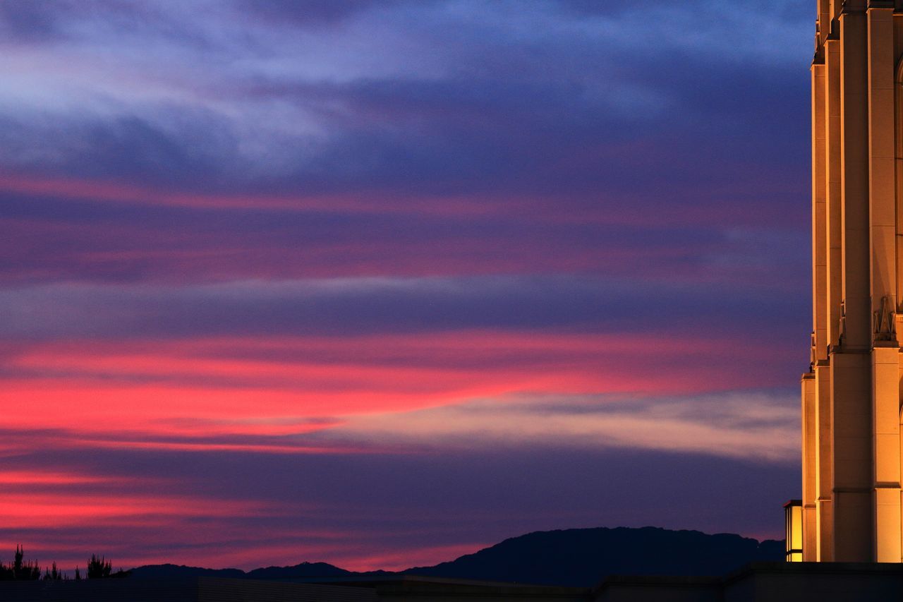 SILHOUETTE OF BUILDINGS AT SUNSET