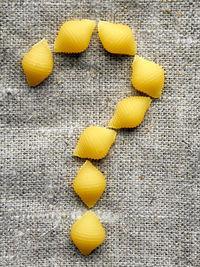 High angle view of yellow fruits on table