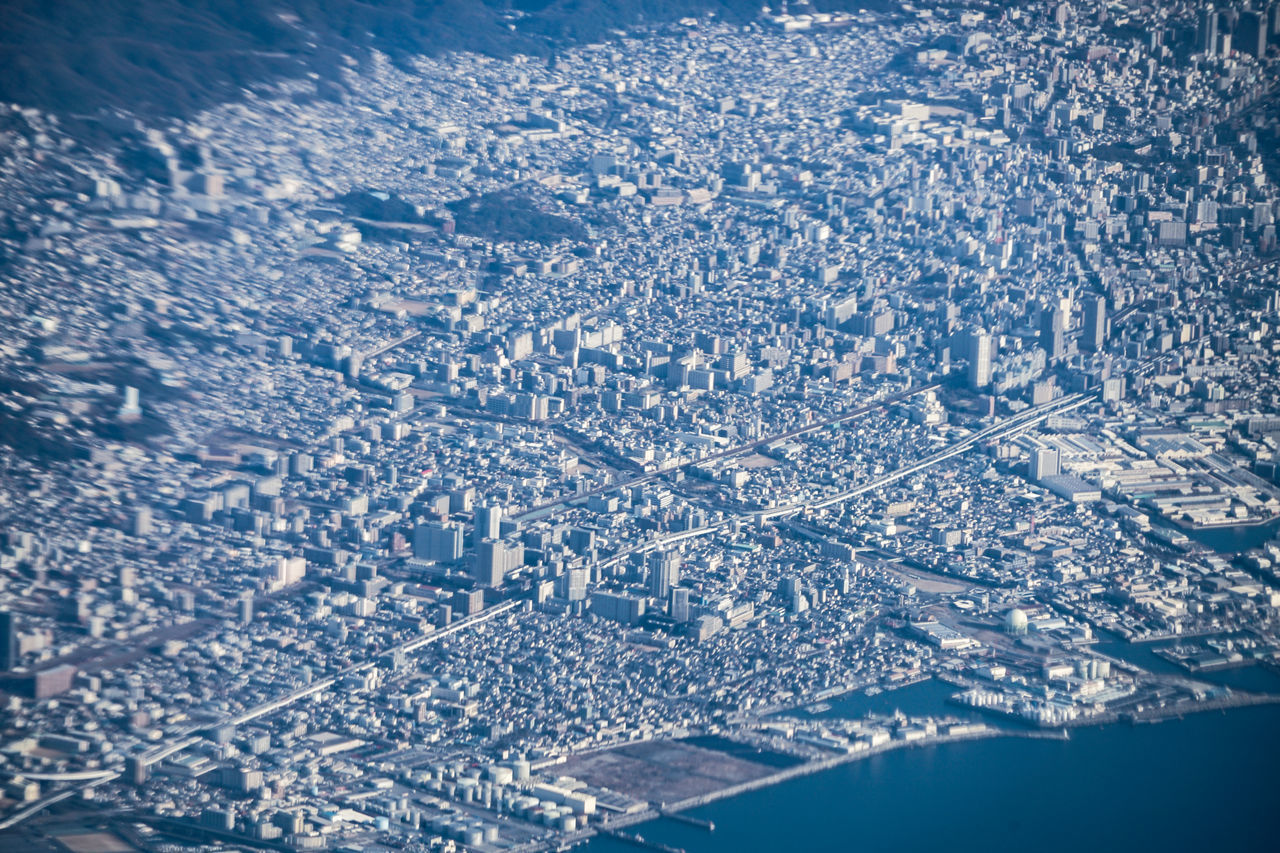 HIGH ANGLE VIEW OF CITYSCAPE DURING WINTER