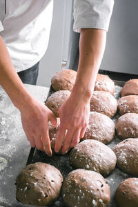 Close-up of hands preparing food