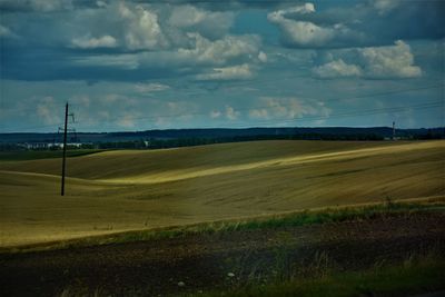 Scenic view of field against sky