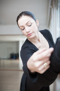 Young woman exercising at gym