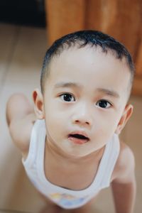 Close-up of cute baby girl at home