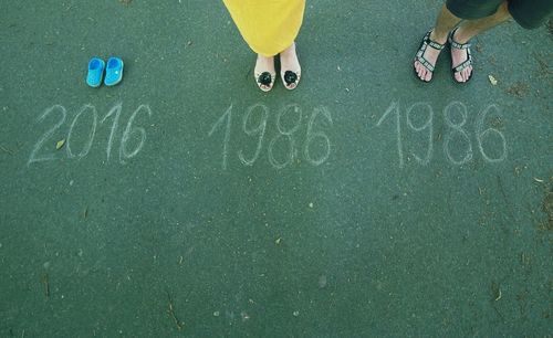 Low section of people standing on the floor