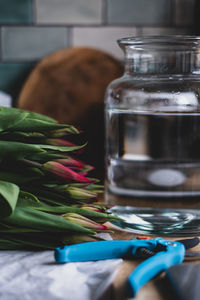 Close-up of ice cream in glass jar on table