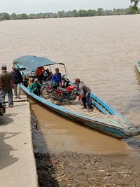 High angle view of people on boat in river