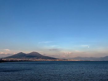 Scenic view of sea against blue sky