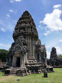 Temple against cloudy sky