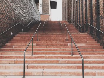 Empty steps amidst buildings