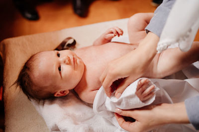 Midsection of woman lying down