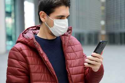 Young man using mobile phone