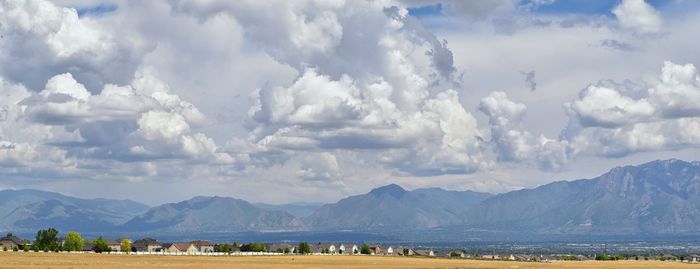 Panoramic view of landscape and mountains against sky