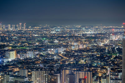 Urban view of tokyo at night as seen from a high-rise building in ebisu, shibuya-ku, tokyo.