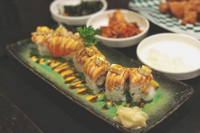 Close-up of sushi served in plate