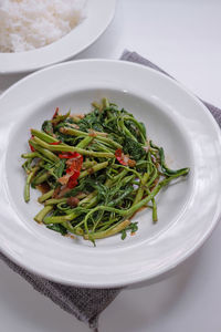 High angle view of salad in bowl on table