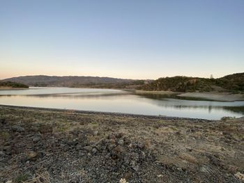 Scenic view of lake against clear sky