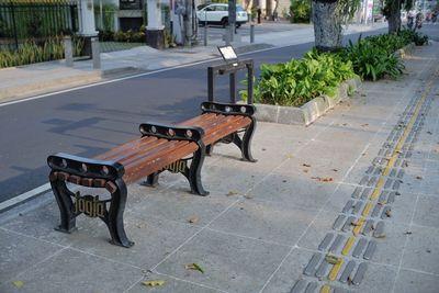 Yogyakarta, indonesia, may 1, 2020. park chairs in public spaces on a clean pedestrian path