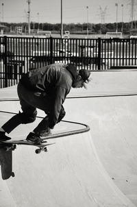 Man skateboarding at skate park