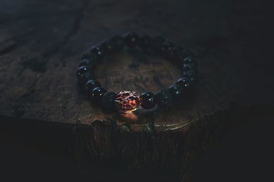 Close-up of bracelet on table