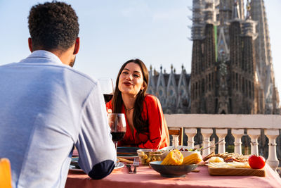 Portrait of smiling friends having food