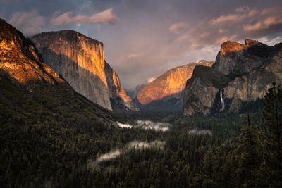 Scenic view of mountains against sky during sunrise