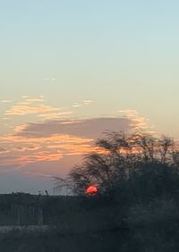 Scenic view of silhouette landscape against sky during sunset