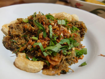 Close-up of served food in plate