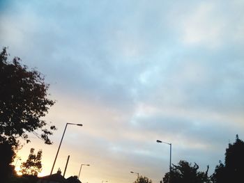 Low angle view of cloudy sky at sunset