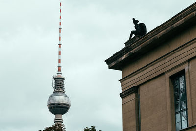 Low angle view of building against fernsehturm