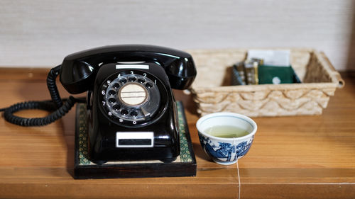 High angle view of telephone on table