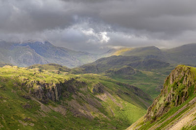 Sun starting to break over the hill in the lake district, cumbria, uk