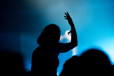 Silhouette people enjoying at music concert