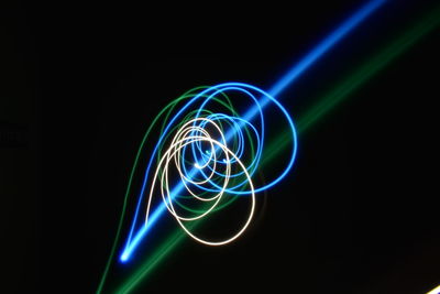 Light painting against black background