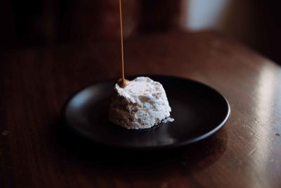 Close-up of dessert in plate on table