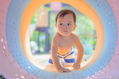 Cute boy playing at playground