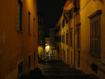 Illuminated buildings in city at night