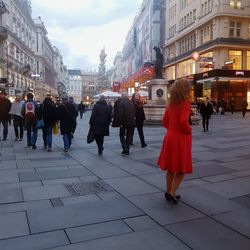 People walking on street in city