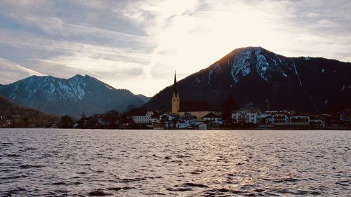 Scenic view of snowcapped mountains against sky during sunset