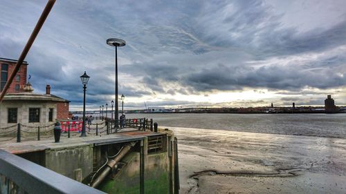 Pier on sea against sky