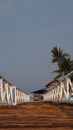 Built structure on beach against clear sky