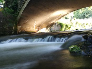 River flowing through tunnel